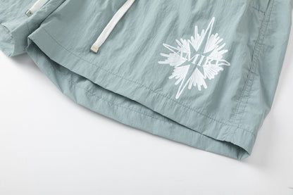 AMRI Starburst logo shell swim shorts